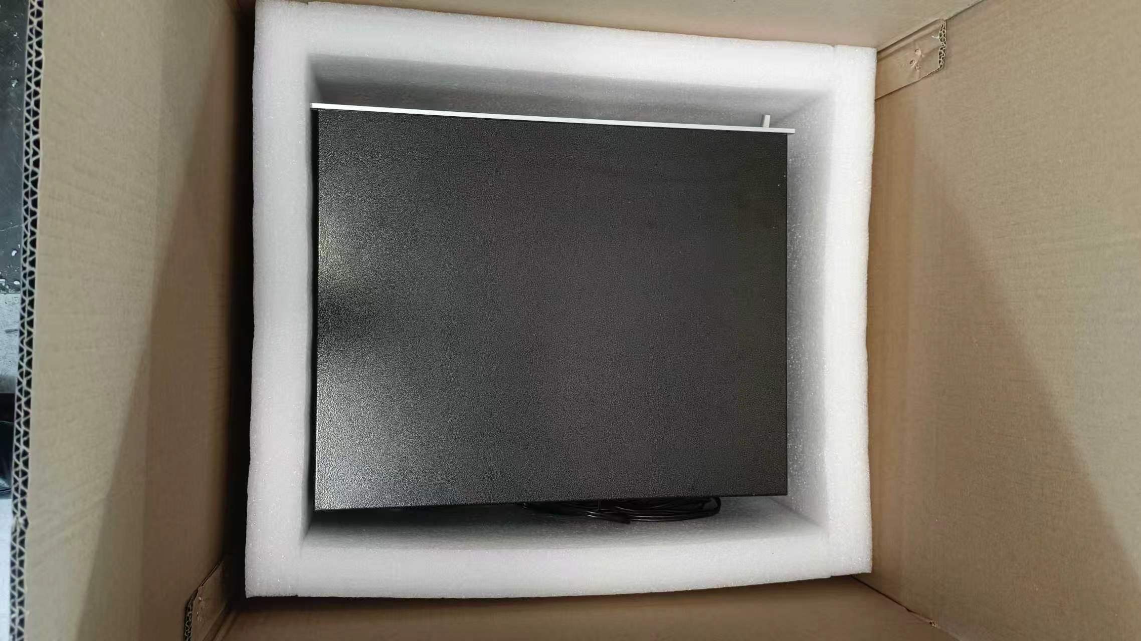 RT-3150 top cover panel packed in white foam inside the carton