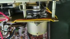 Motor with brass rear cover back in the deck transport