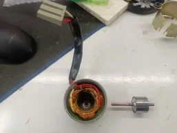 HA1-7 motor with its wiring and rear shaft parts laid out